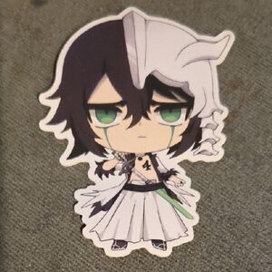 Chibi Character Sticker with Green and Black Accents